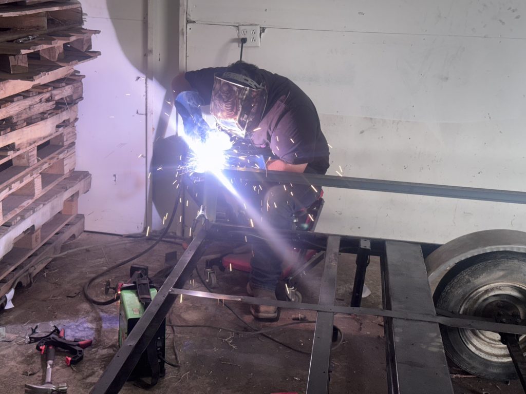IMG_2949 technician welding side rail